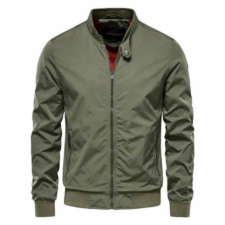 Men's olive green bomber jacket with front zipper, snap collar, zip pockets, and ribbed cuffs