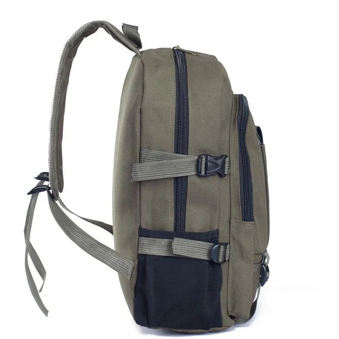 Side view of gray and black durable canvas backpack with multiple zippered compartments and adjustable straps