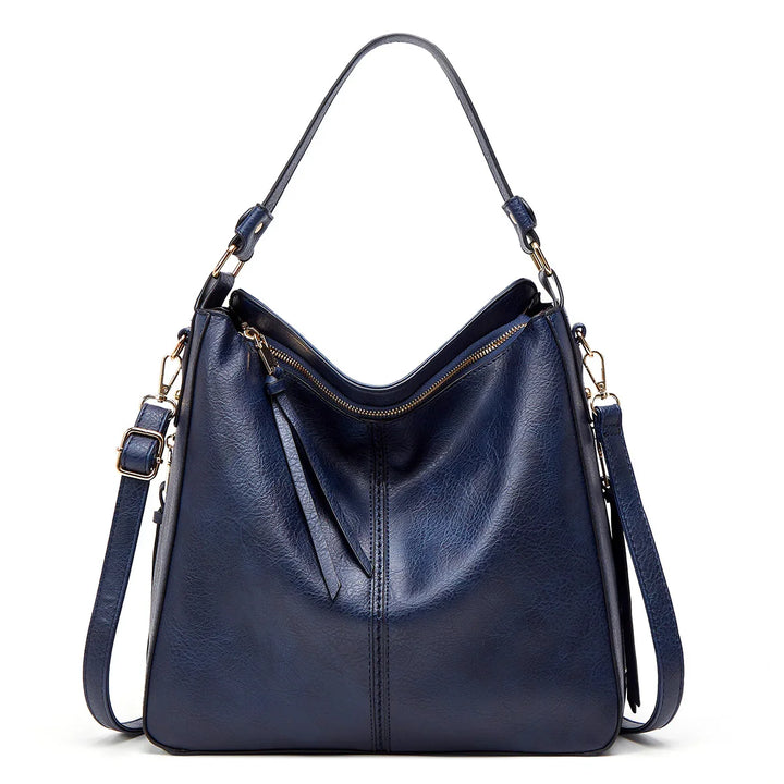 Elegant navy blue leather hobo handbag with gold zipper and adjustable shoulder strap