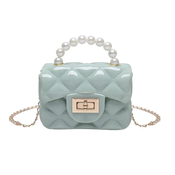 Glossy light blue quilted handbag with pearl handle and gold chain strap