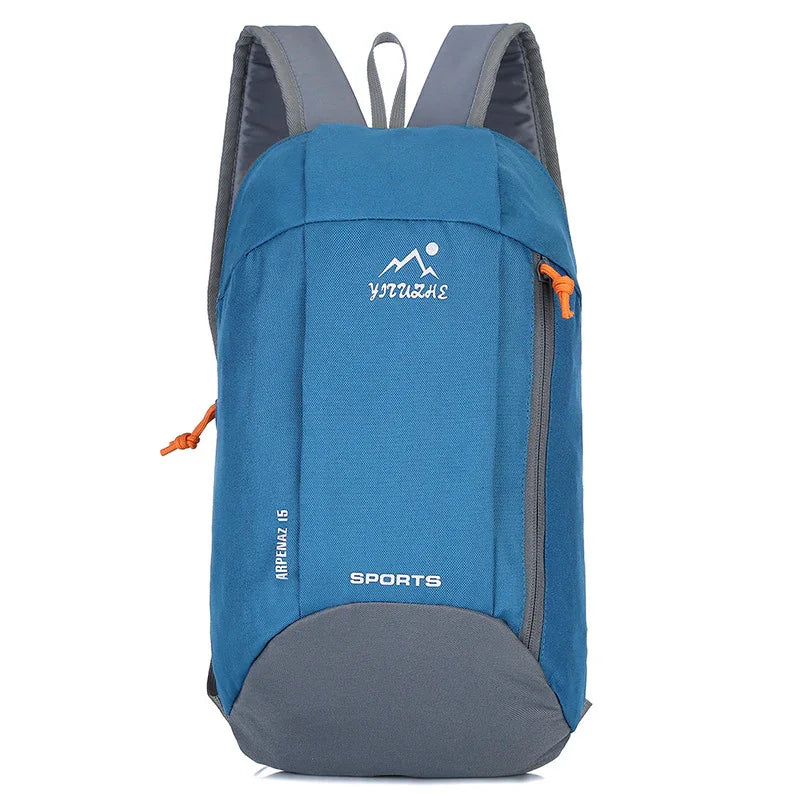 Blue and gray sports backpack with orange zipper pull, upright on white background