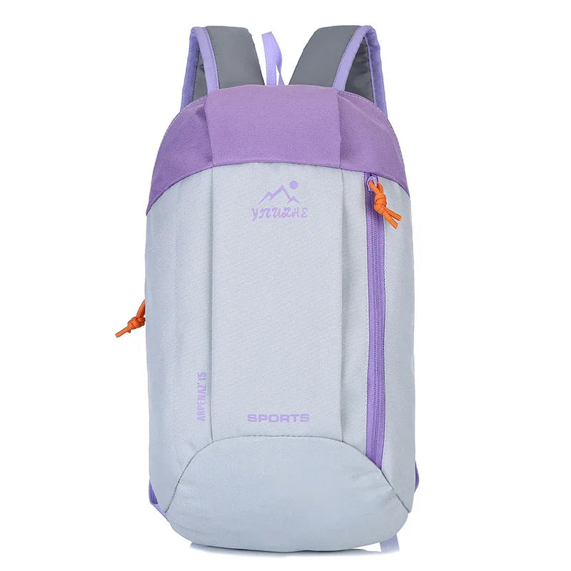 Light gray and purple sports backpack with front zipper and orange pull tab