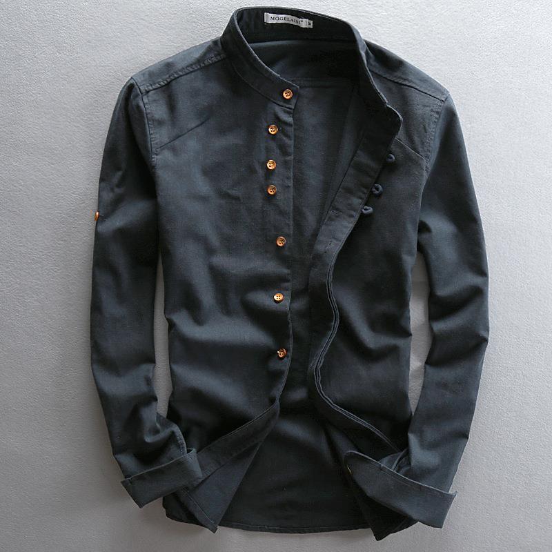Black men's long-sleeve shirt with mandarin collar and contrasting brown buttons on gray background