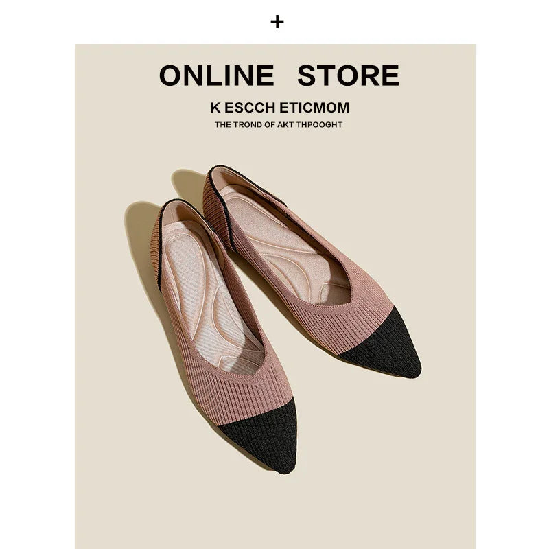 Pair of pink and black pointed toe flats on beige background with online store text