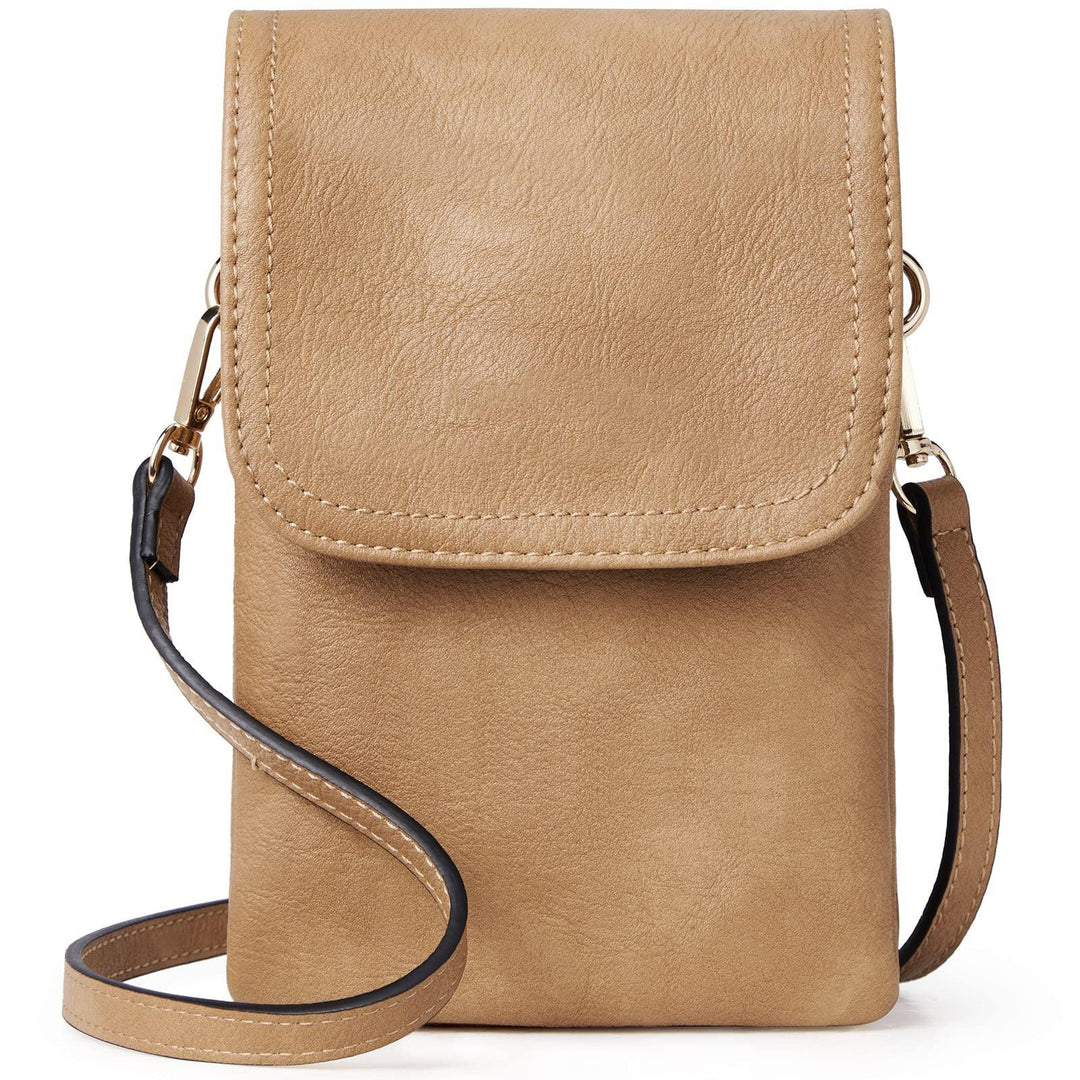 Tan faux leather crossbody bag with flap closure and adjustable strap