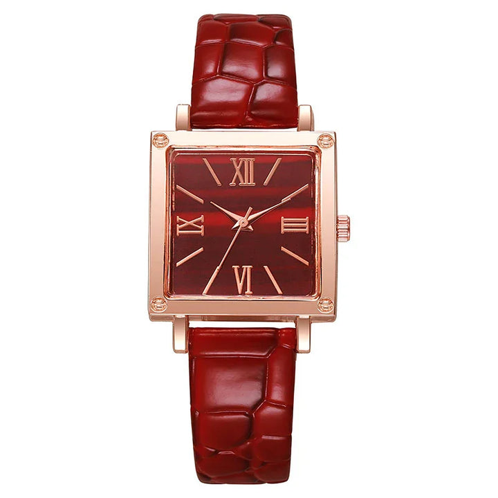 Square red wristwatch with rose gold frame and Roman numeral dial, red textured leather strap