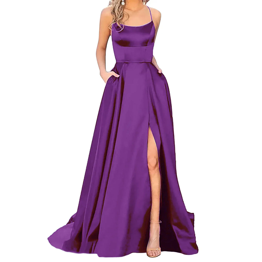 Elegant purple satin evening gown with spaghetti straps and thigh-high slit