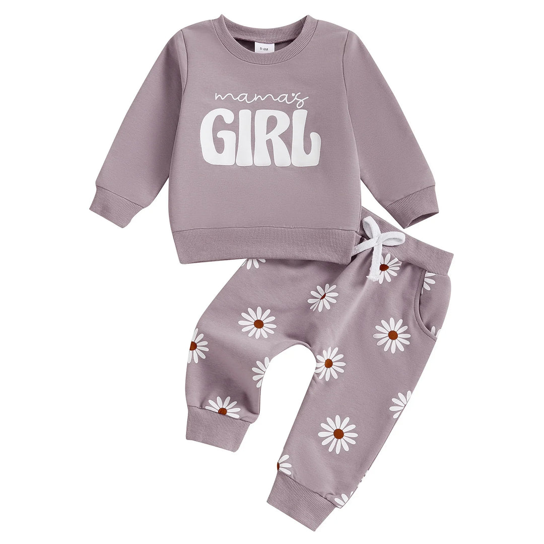 Purple baby girl outfit with long sleeve top reading 'mama's girl' and daisy print pants