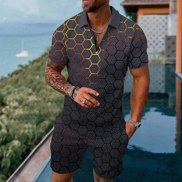 Man wearing black hexagon patterned short sleeve zip polo shirt and matching shorts by poolside with ocean view