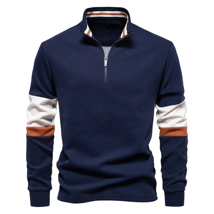 Men's navy blue quarter-zip sweatshirt with white and brown colorblock sleeves and striped collar