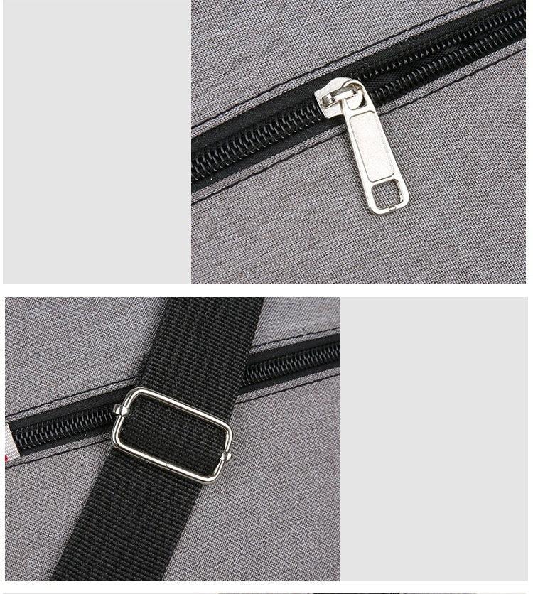 Close-up of gray fabric bag featuring black zipper with metal pull and adjustable black strap buckle