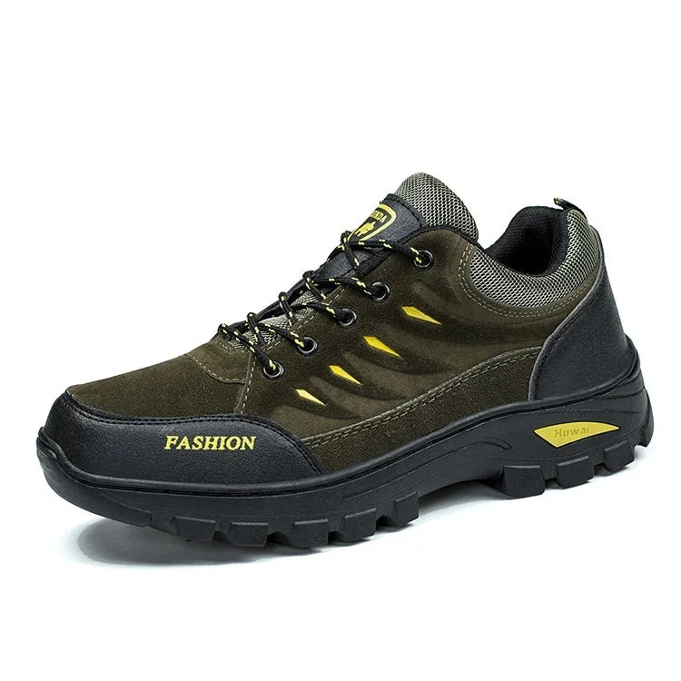olive green and black durable hiking shoe with yellow accents and rugged sole