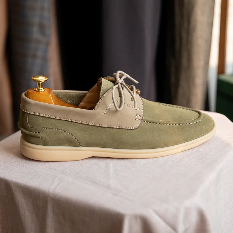 beige and olive green suede casual lace-up shoe with light sole on white cloth