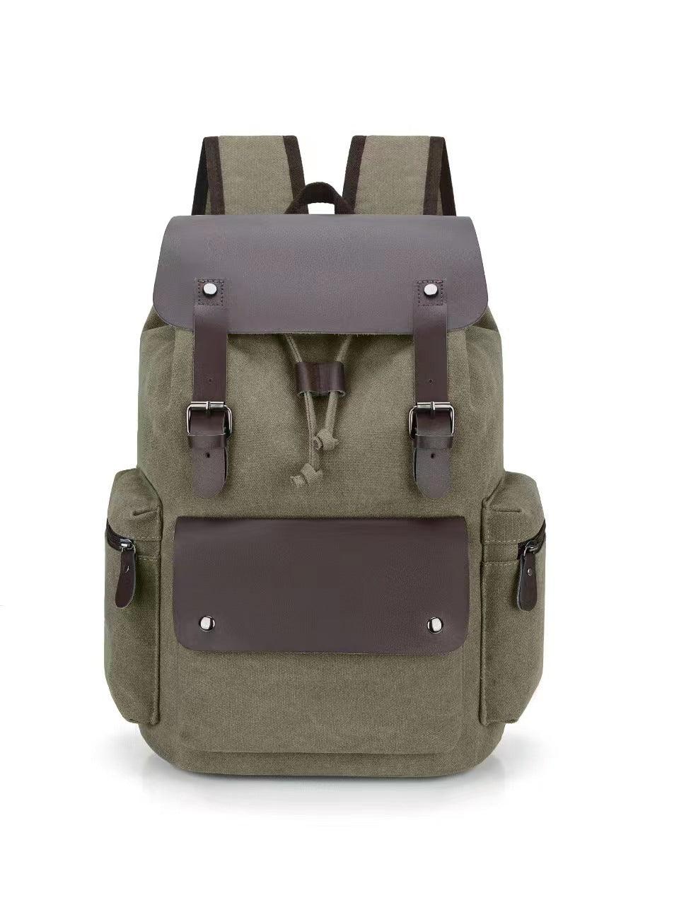 Olive green canvas backpack with brown leather flap, front pocket, side pockets, and adjustable straps