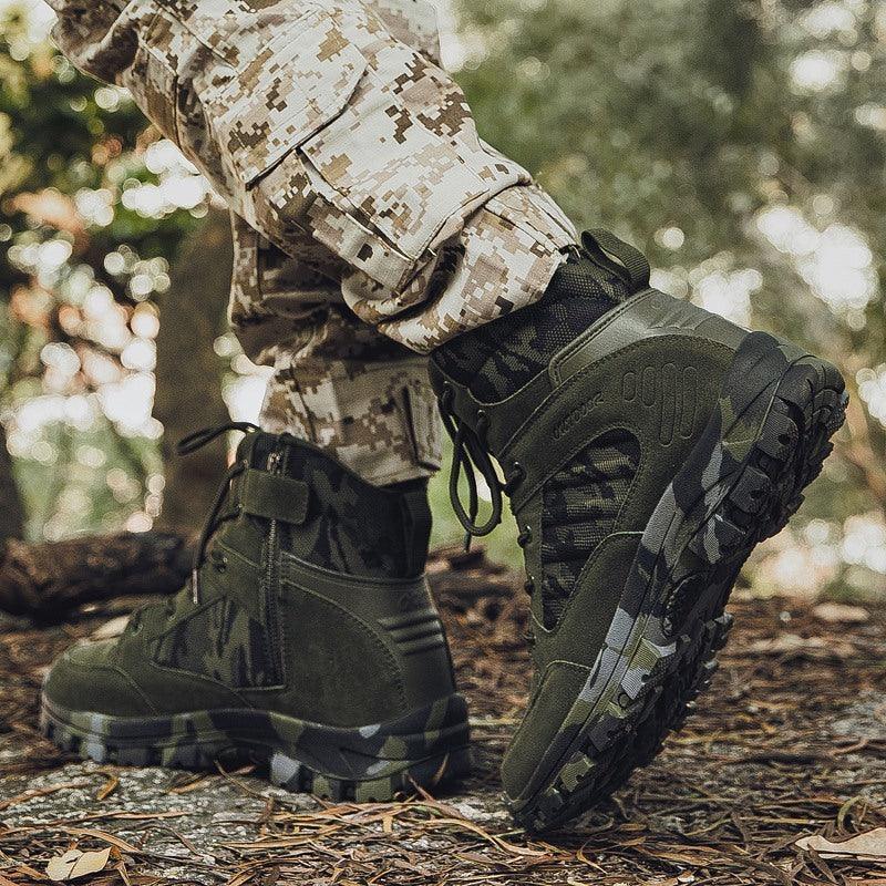 Close-up of person wearing camouflage tactical boots and digital camo pants standing on forest ground
