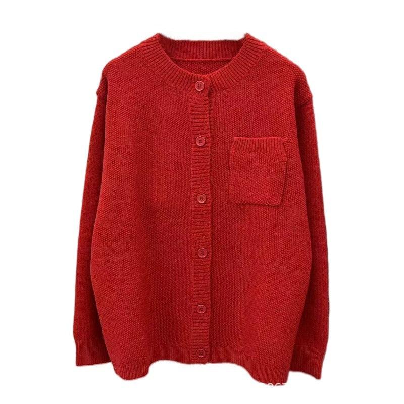 Red knitted button-up cardigan with a small chest pocket and ribbed collar and cuffs