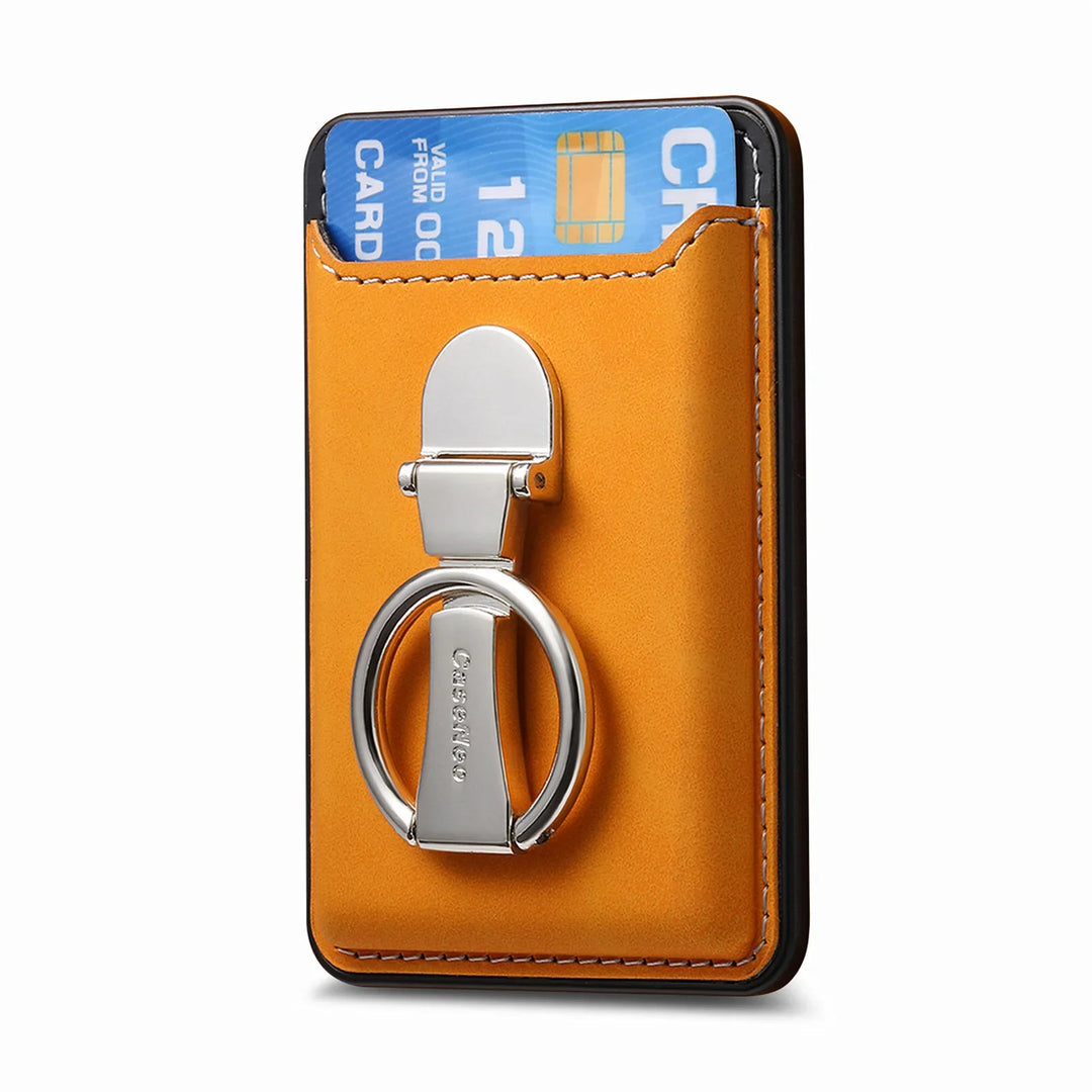 orange leather card holder with metal ring and blue credit card inserted