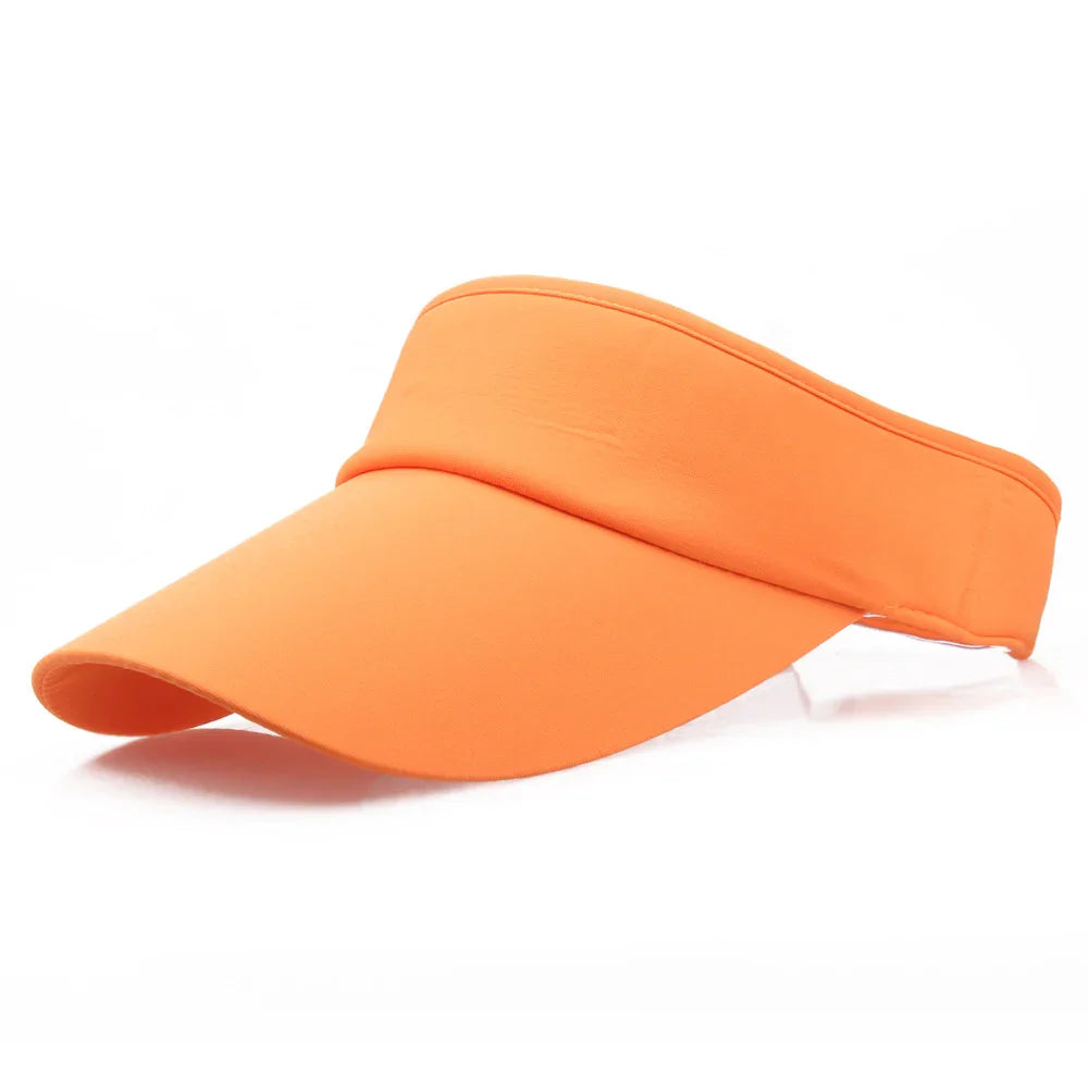 Bright orange sports visor cap with curved brim on white background