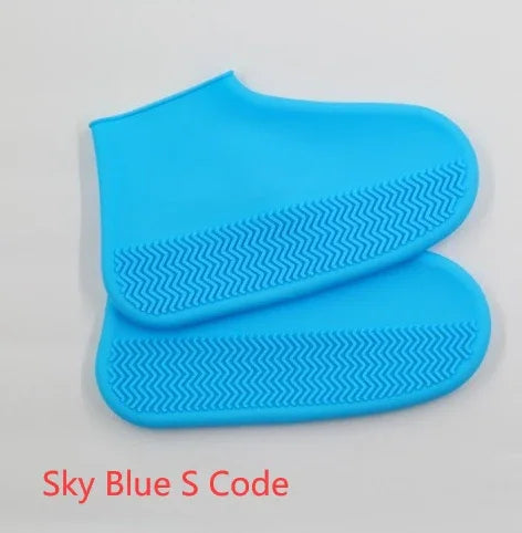 Sky blue silicone shoe covers with textured non-slip sole pattern, small size