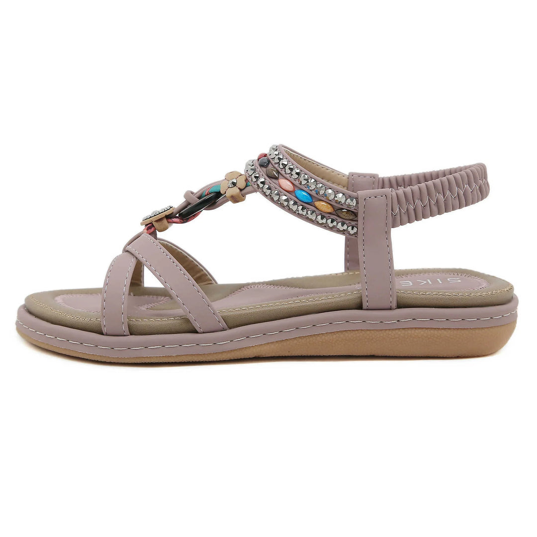 Beige flat sandal with colorful beads and rhinestone straps, elastic back strap, cushioned sole