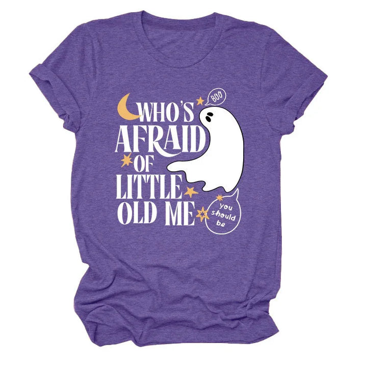 Purple Halloween t-shirt with white ghost and text saying Who's afraid of little old me, spooky graphic tee