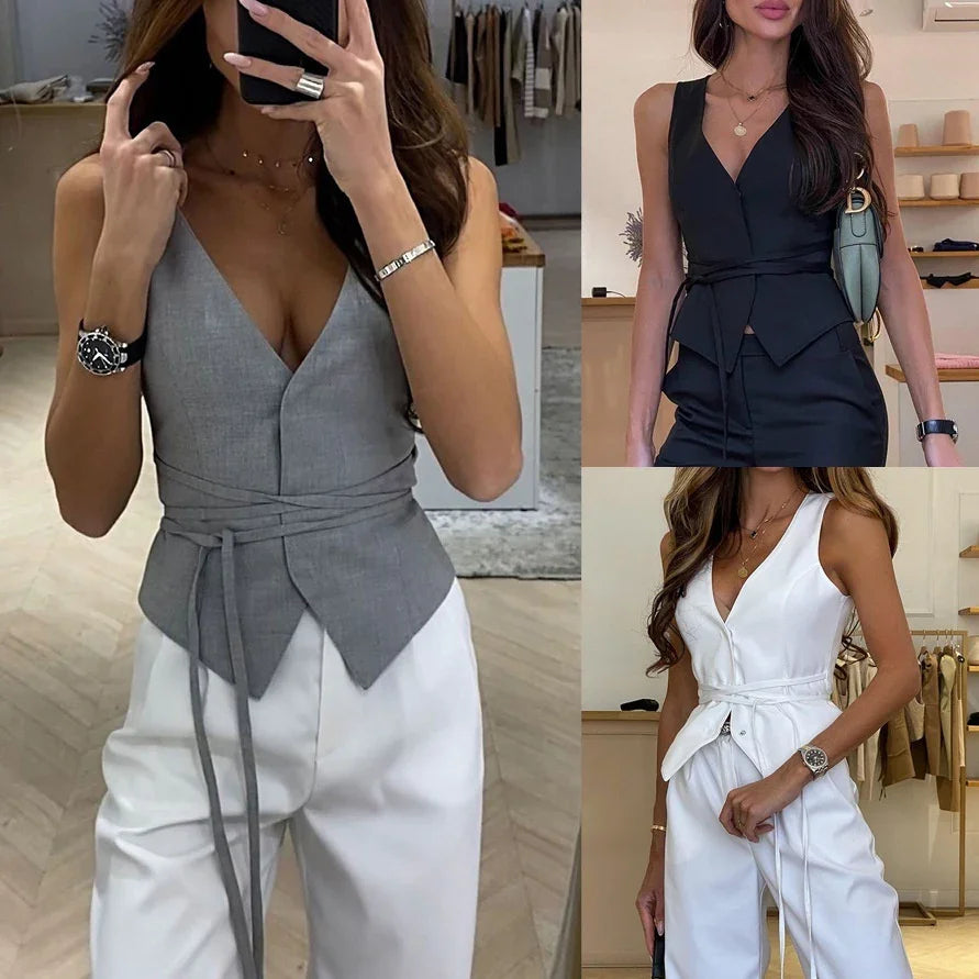 Women wearing sleeveless v-neck wrap tops in gray, black, and white paired with white pants in modern indoor settings