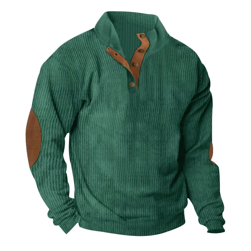 Green ribbed pullover sweater with brown buttoned collar and elbow patches