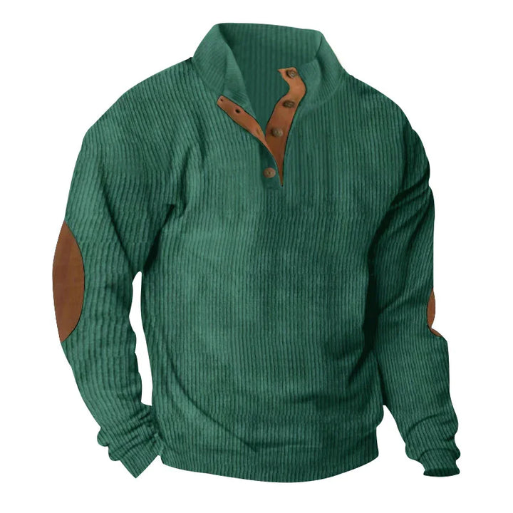 Green ribbed pullover sweater with brown buttoned collar and elbow patches