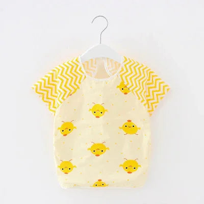 Yellow baby bib with cute chick prints and zigzag patterned sleeves hanging on white hanger