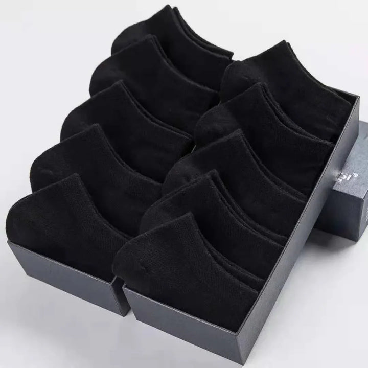 Pack of black low-cut ankle socks neatly arranged in a rectangular box on white background