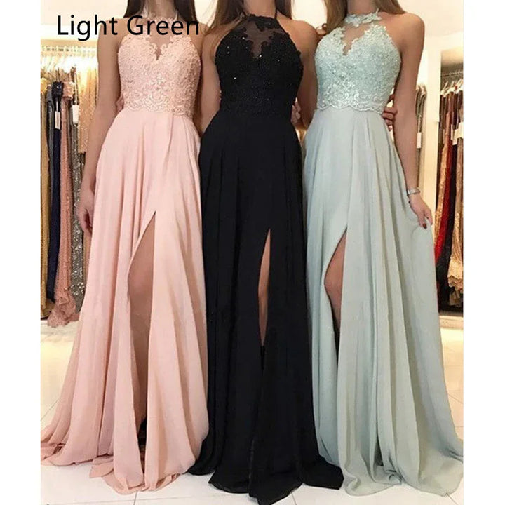 Three women wearing floor-length evening gowns with high slits in pink, black, and light green colors