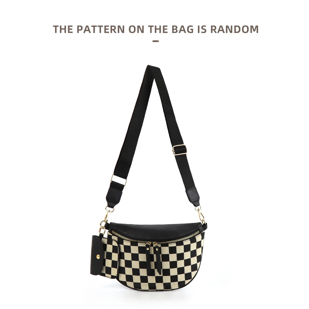 Black and white checkered crossbody bag with adjustable black strap and gold hardware