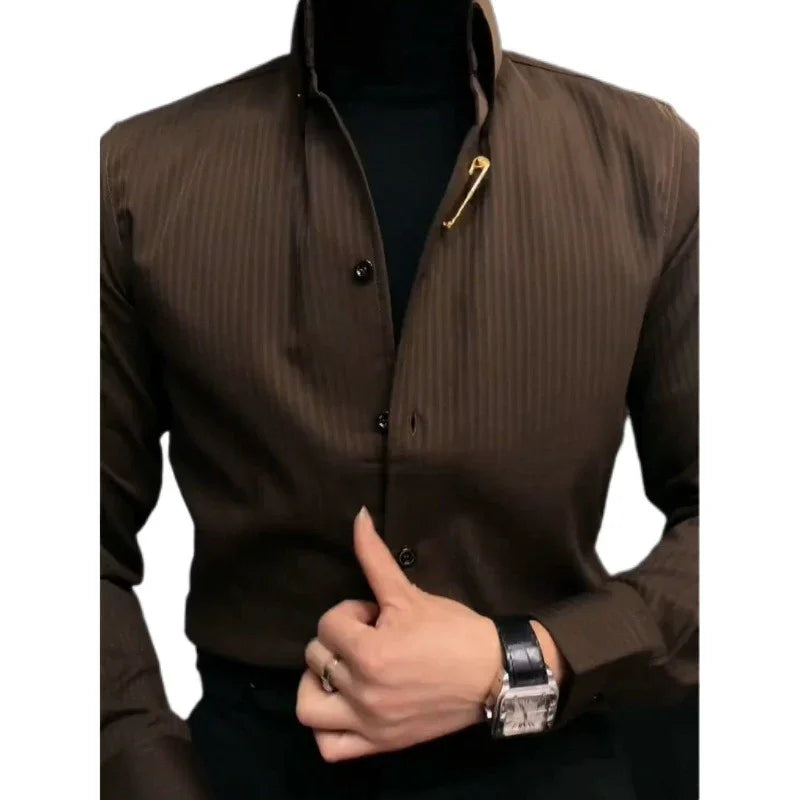 Man wearing brown pinstripe shirt with black inner turtleneck and wristwatch, fastening cuff