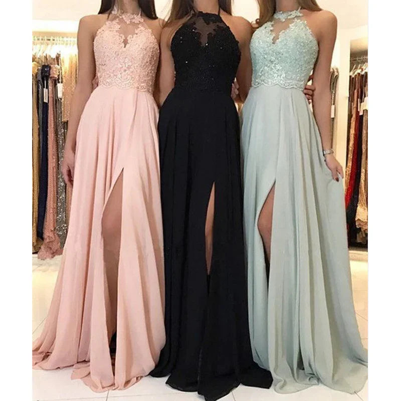 Three women wearing elegant sleeveless evening gowns with lace bodices and thigh-high slits in pink, black, and light blue