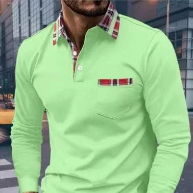 Man wearing light green long-sleeve polo shirt with plaid collar and pocket detail in urban setting