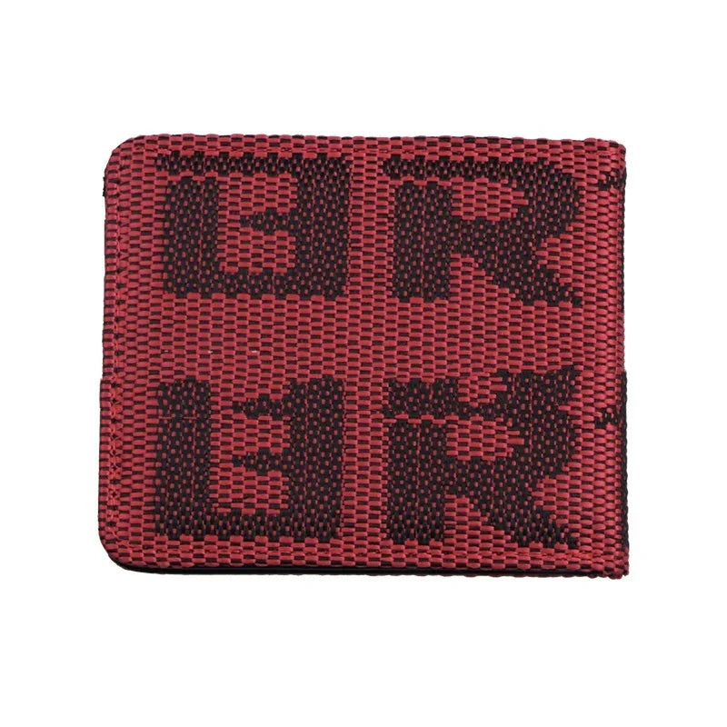 Red and black woven fabric wallet with bold RUK logo pattern