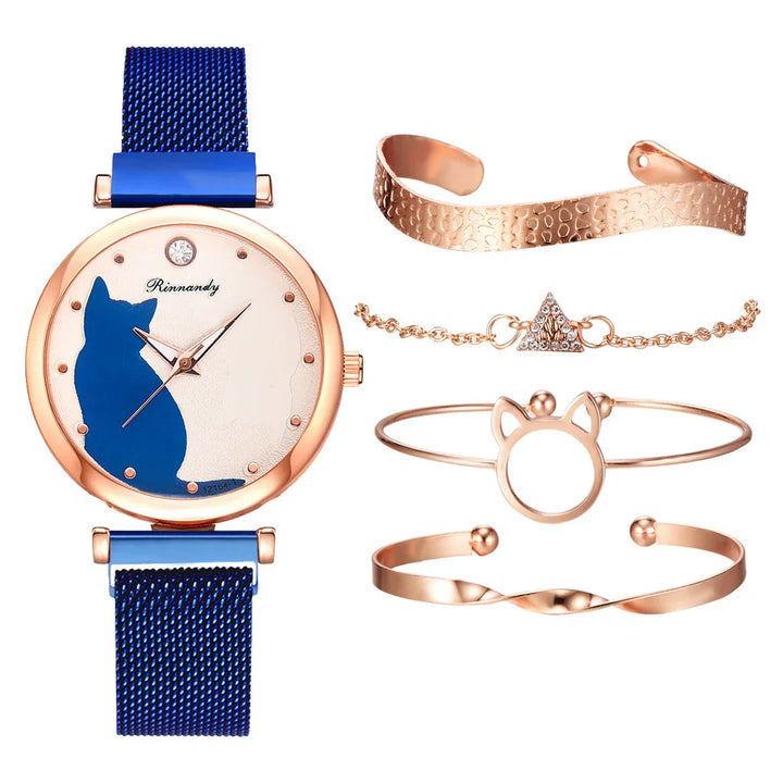 Rose gold watch with blue cat silhouette and matching rose gold bracelets on white background