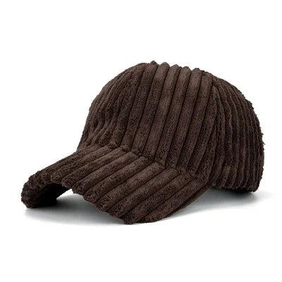 Dark brown ribbed corduroy baseball cap with curved brim on white background