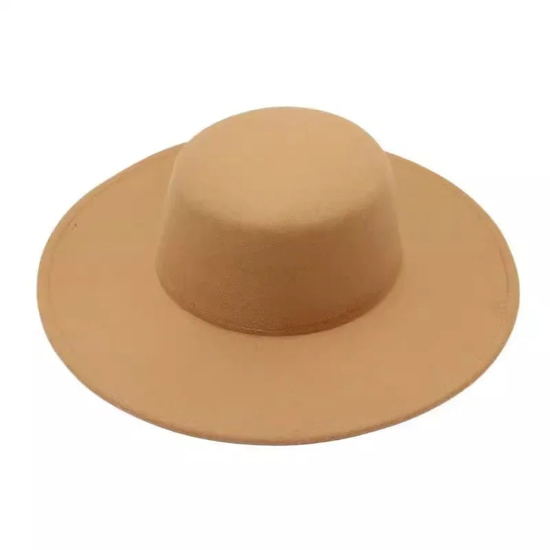 Wide brim tan felt hat with flat crown on white background