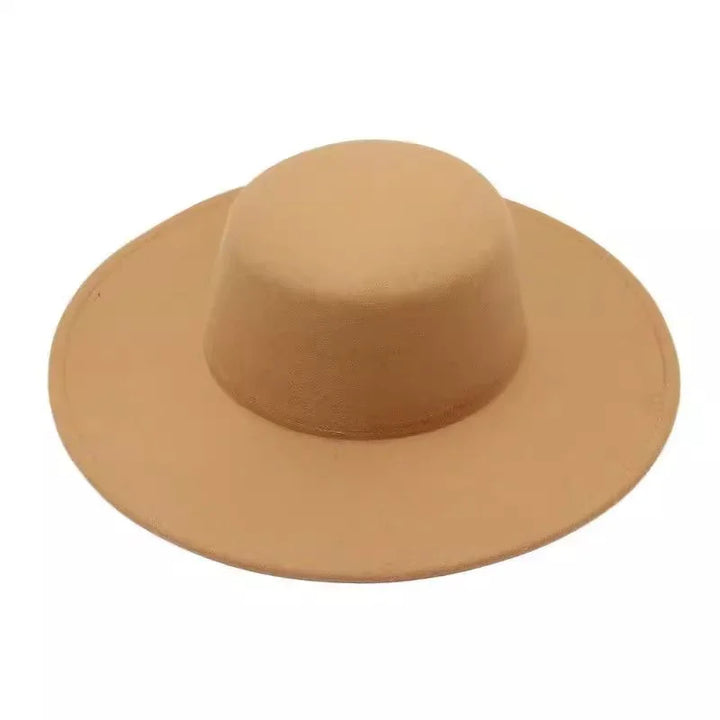 Wide brim tan felt hat with flat crown on white background