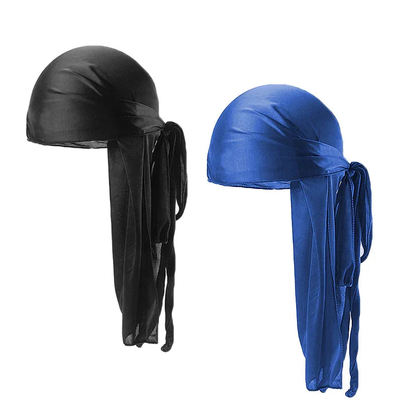 Black and blue satin durag headwraps with long tail ties on white background