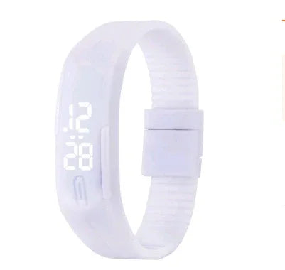 White digital wristband fitness tracker with LED display showing time 12:28