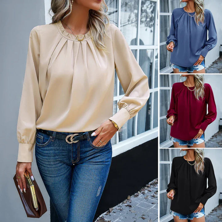 Women wearing pleated long sleeve blouses in beige, blue, burgundy, and black with jeans or shorts, accessorized with necklace and clutch