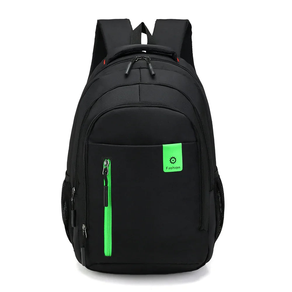 Black backpack with green zipper and fashion tag, multiple compartments and padded straps