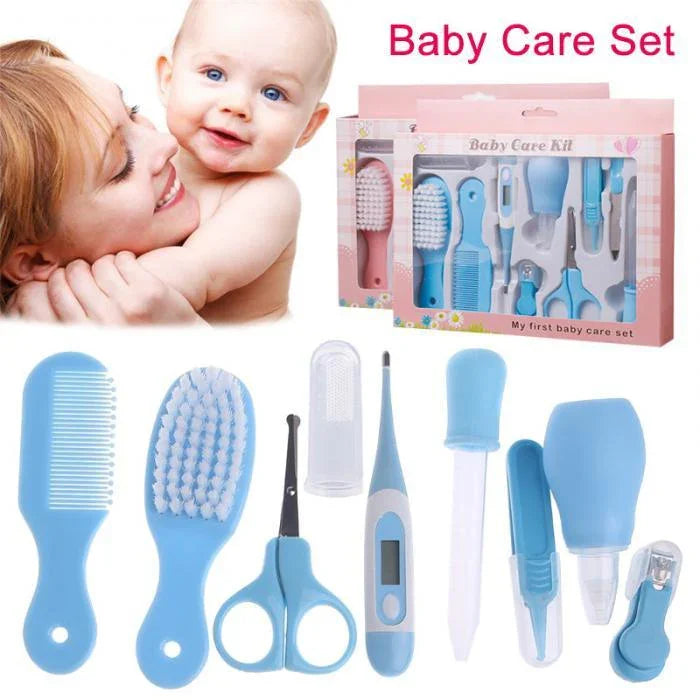 Blue baby care set with comb, brush, scissors, thermometer, nail clipper, and dropper, boxed kit