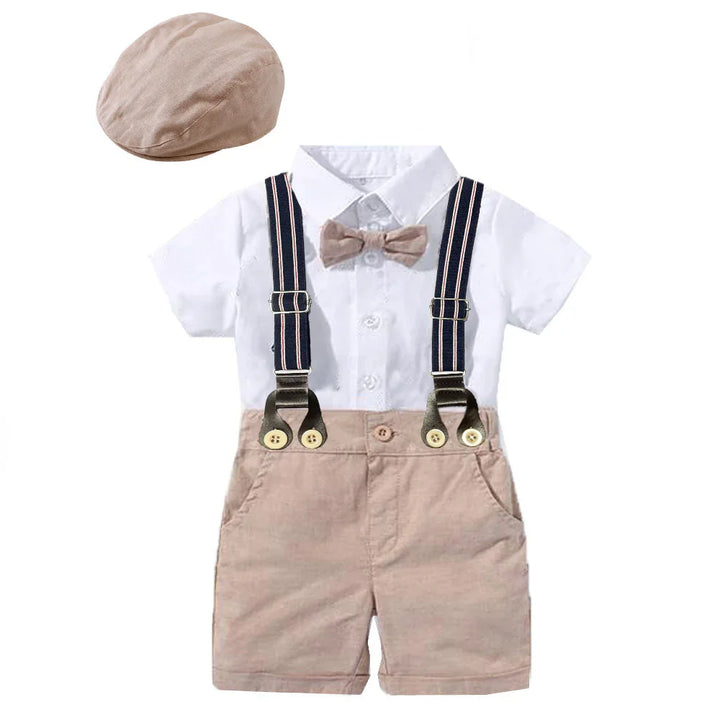 Baby boy outfit with white collared shirt, beige shorts, suspenders, bow tie, and matching cap
