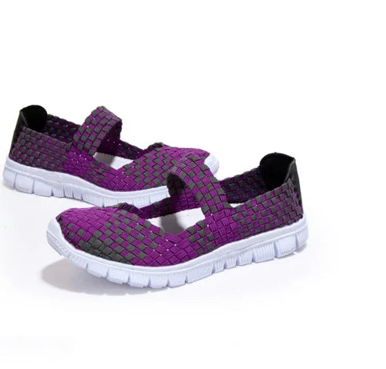 Purple and black woven slip-on casual shoes with white flexible soles for women