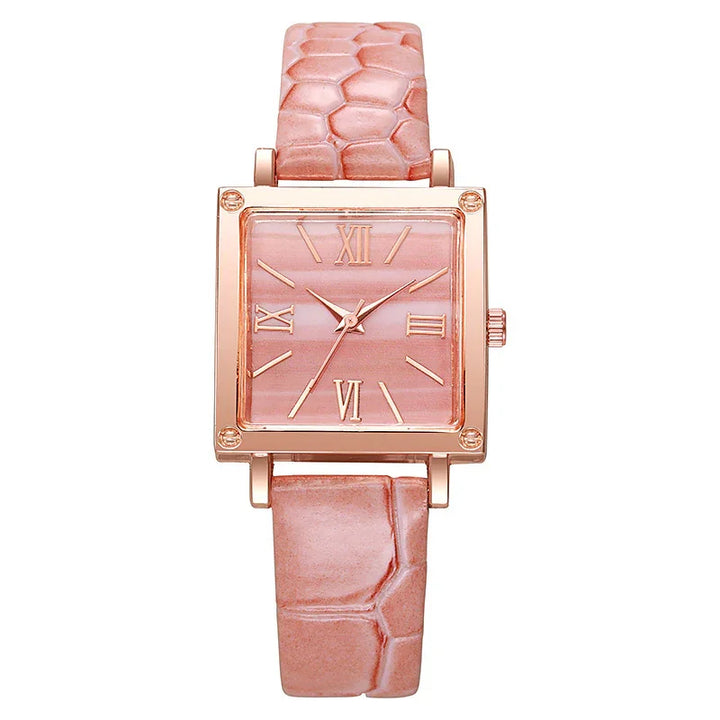 Square rose gold wristwatch with pink marble dial and textured pink leather strap