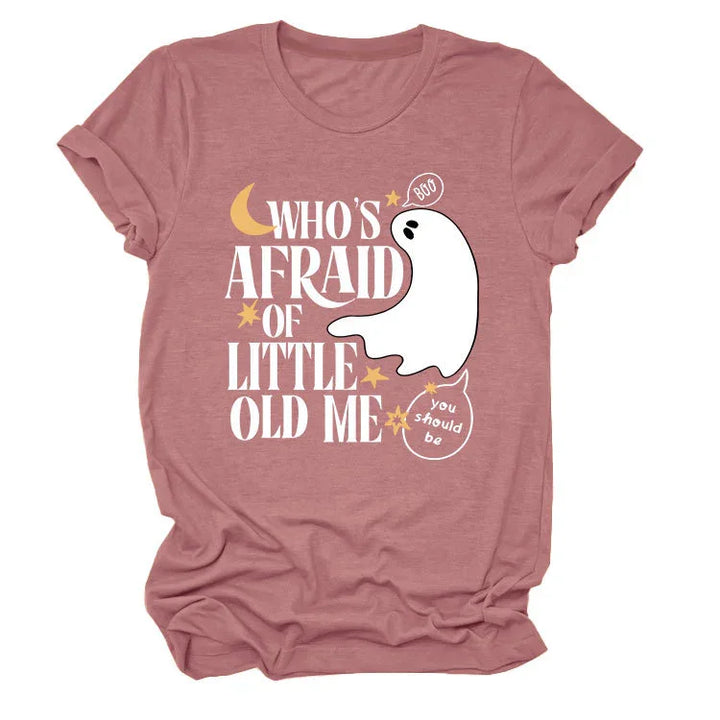 Pink Halloween t-shirt with white ghost and text who's afraid of little old me with moon and stars