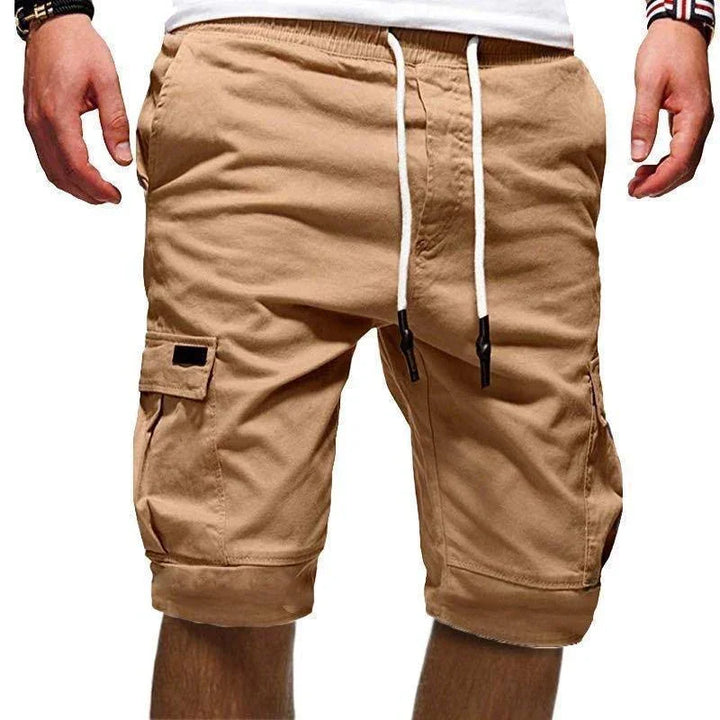 Men's tan cargo shorts with drawstring waist and side pockets, casual summer wear